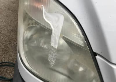 Headlight before cleaning with cleanser- polish applied